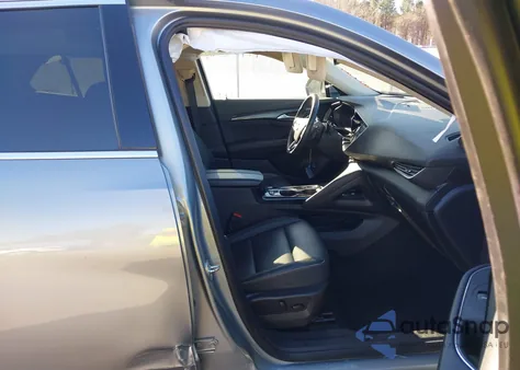 2023 Buick Envision Essence Fwd z USA, uszkodzony, nr VIN LRBFZNR46PD083034